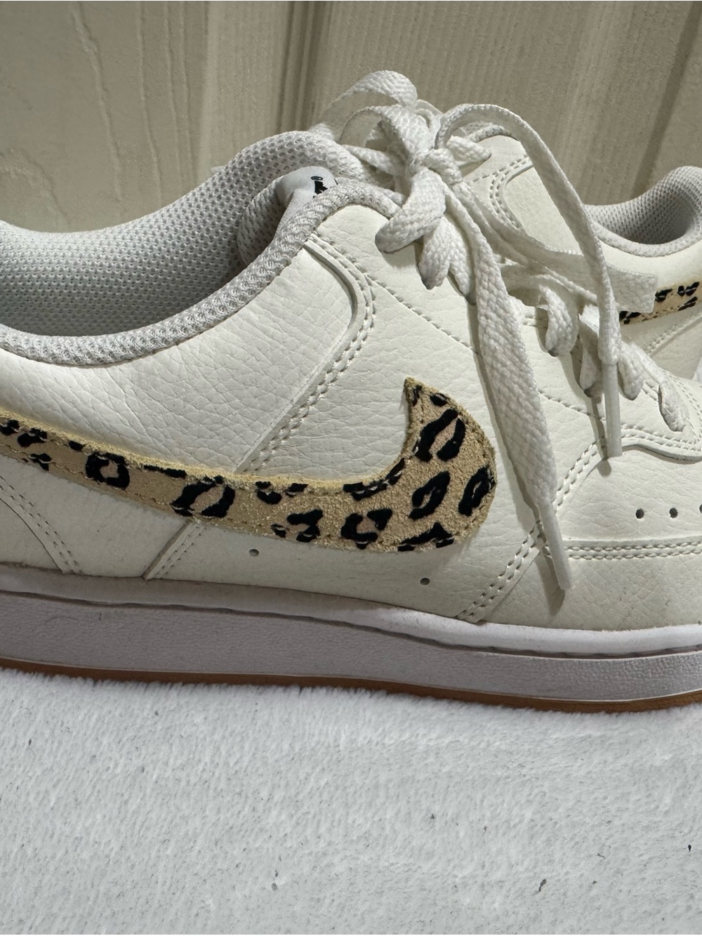 Nike Women's Cream Sneakers with Leopard Print Swoosh